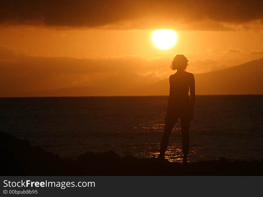 Sunset on Maui, capturing the feminine figure at dawn. Sunset on Maui, capturing the feminine figure at dawn.