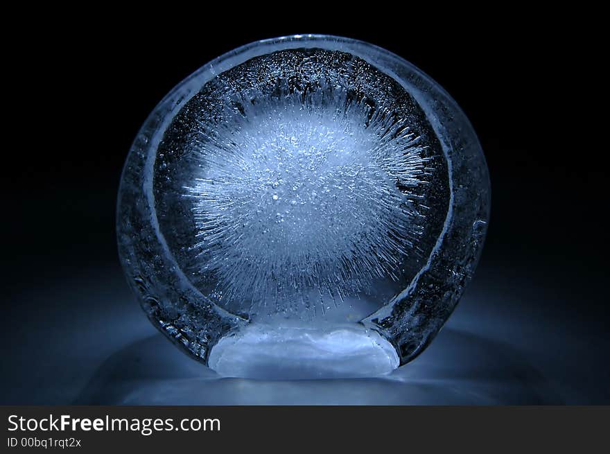 Lump of ice with oxygen explosion inside. Lump of ice with oxygen explosion inside