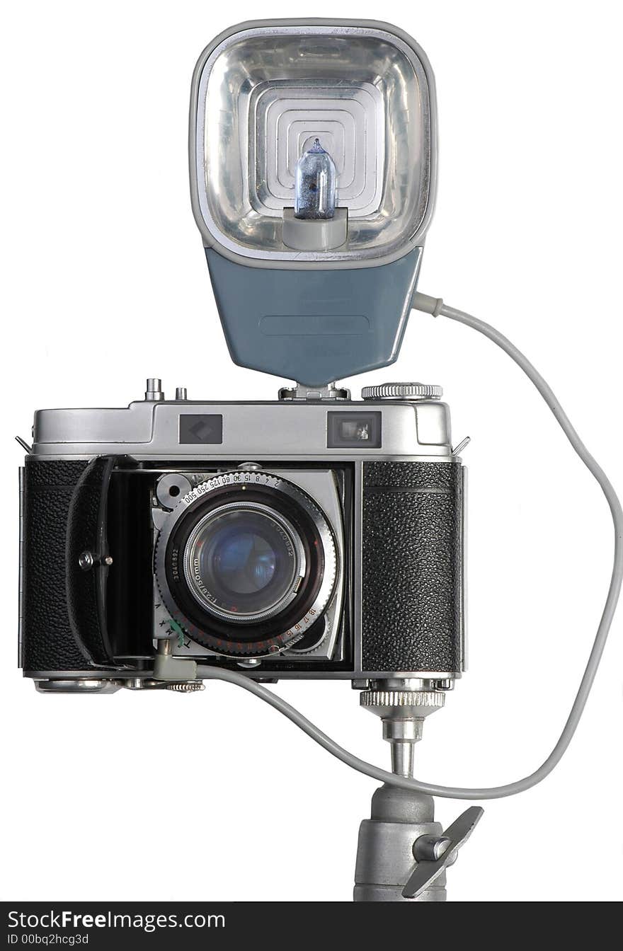 Old camera with a flash on a white background