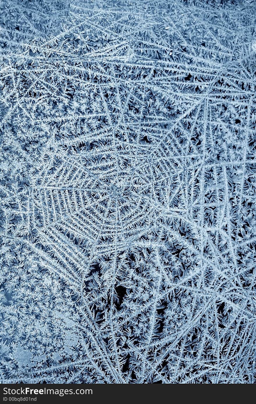 Snowflakes on glass on a black background