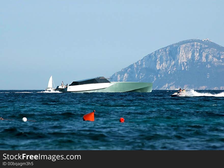 Luxurious boat on vacation cruising in blue sea. Luxurious boat on vacation cruising in blue sea