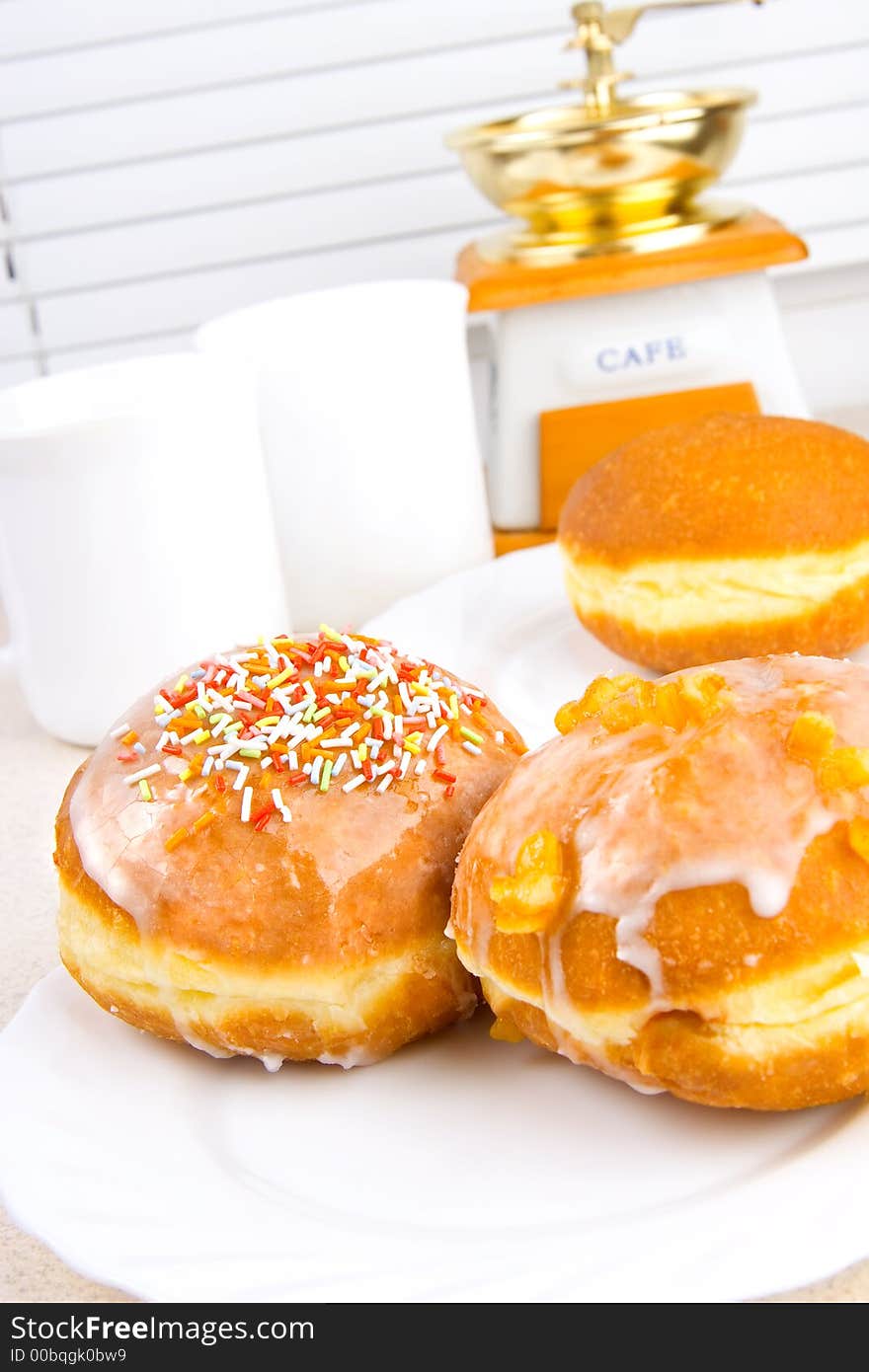 A tasty donuts and a kitchen objects. A tasty donuts and a kitchen objects.