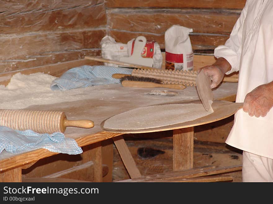 The peasant baking the Swedish national bread. The peasant baking the Swedish national bread