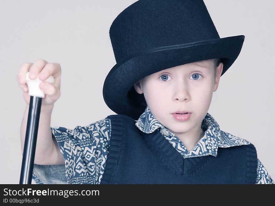 Young sweet boy with a cylinder. Young sweet boy with a cylinder