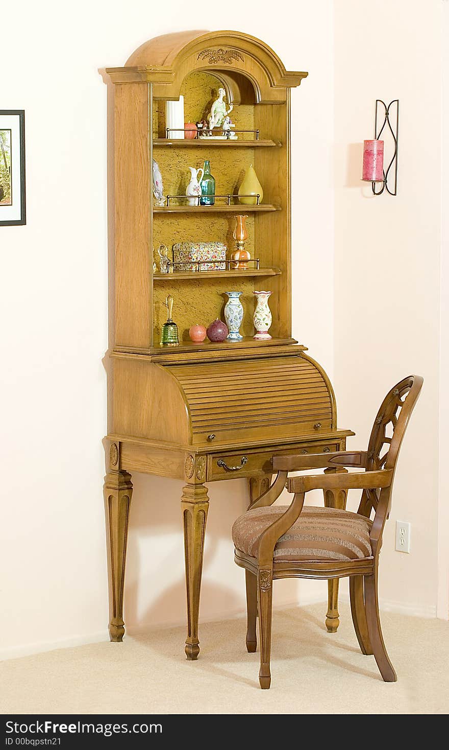 This pecan roll top desk has a home in our living room where it not only serves as my desk it also holds various mementos. This pecan roll top desk has a home in our living room where it not only serves as my desk it also holds various mementos.