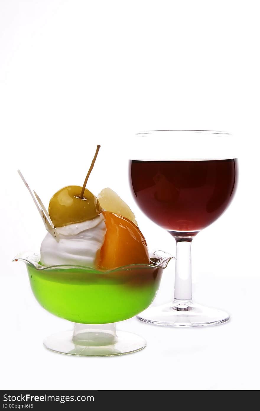 Red wine and delicious dessert in white background. Red wine and delicious dessert in white background.