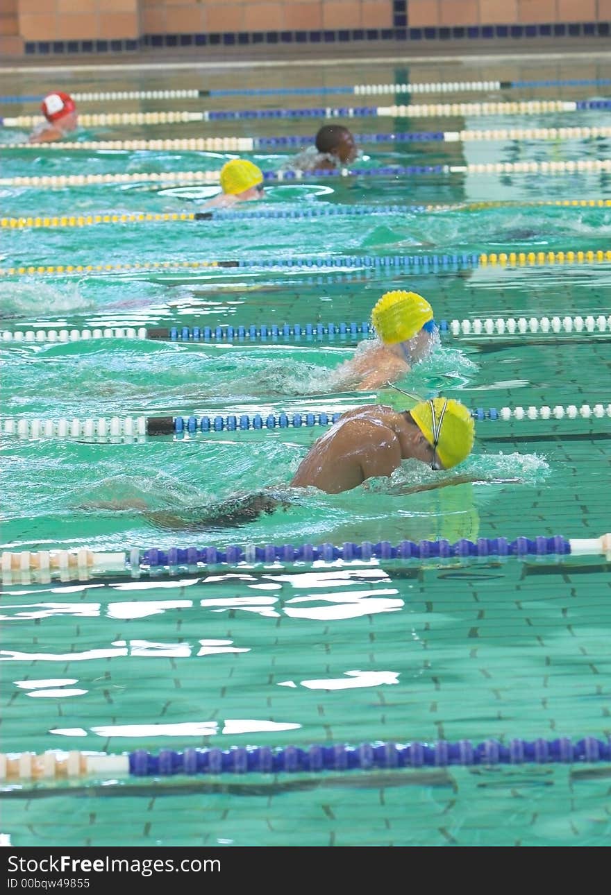 Swimmers competing in breaststroke event at national trials