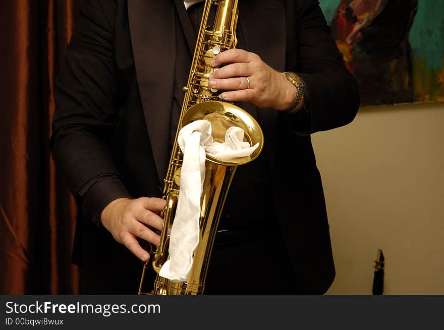 Musicians hands playing Saxophone