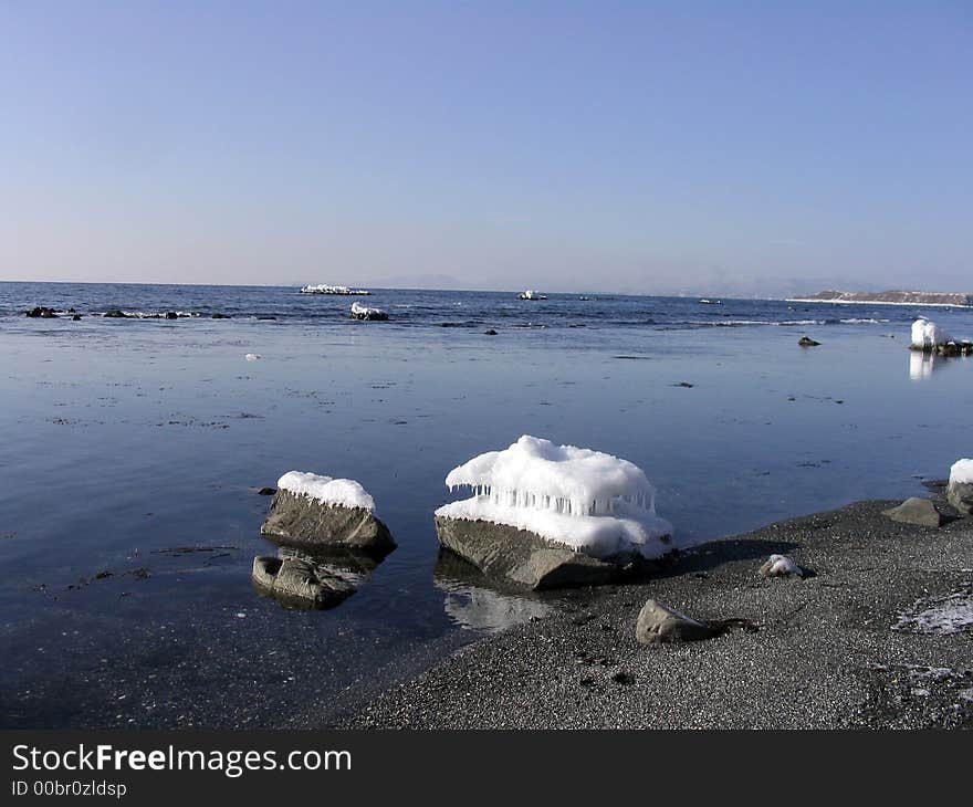 Winter se ocean skies shore waves water storm. Winter se ocean skies shore waves water storm