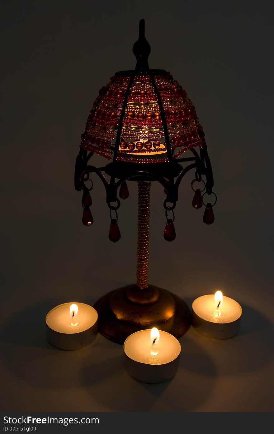 Candlestick with beads