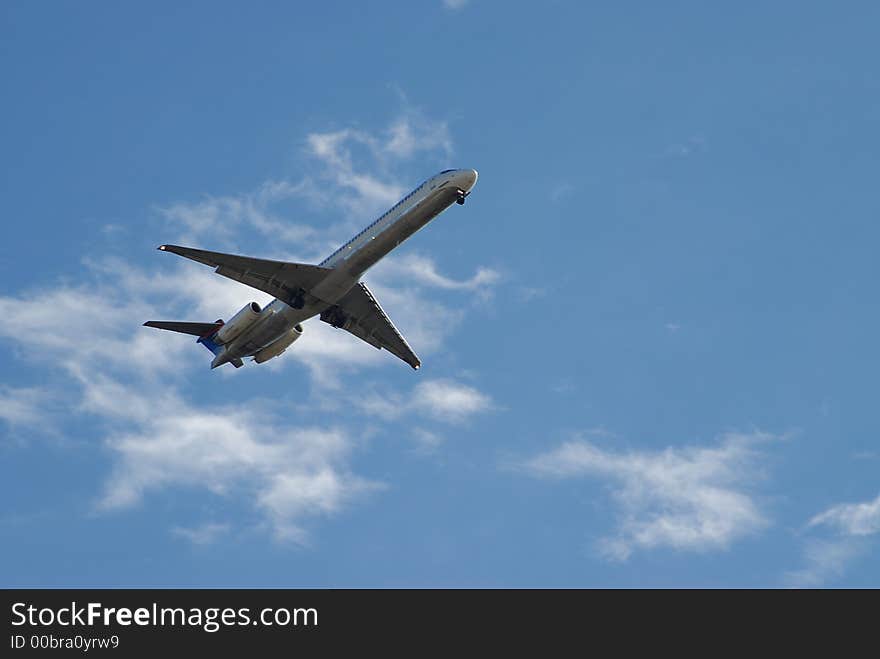 Photographed commercial airliner landing at local airport.