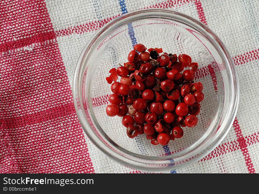 Closeup of glasscup with red berries