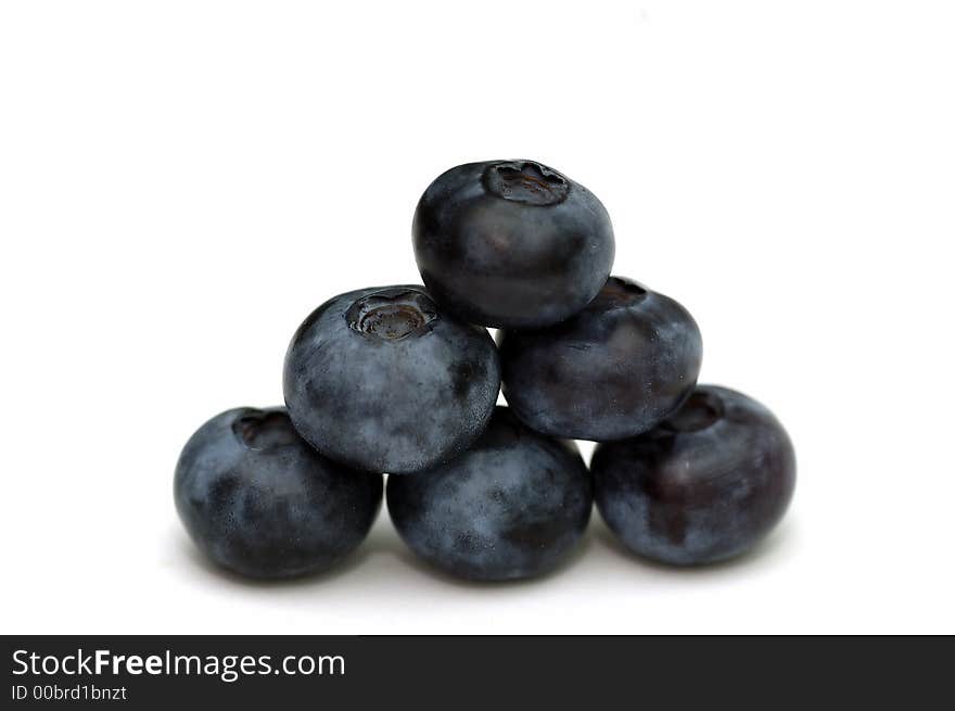 Blue berries isolated against a white background. Blue berries isolated against a white background