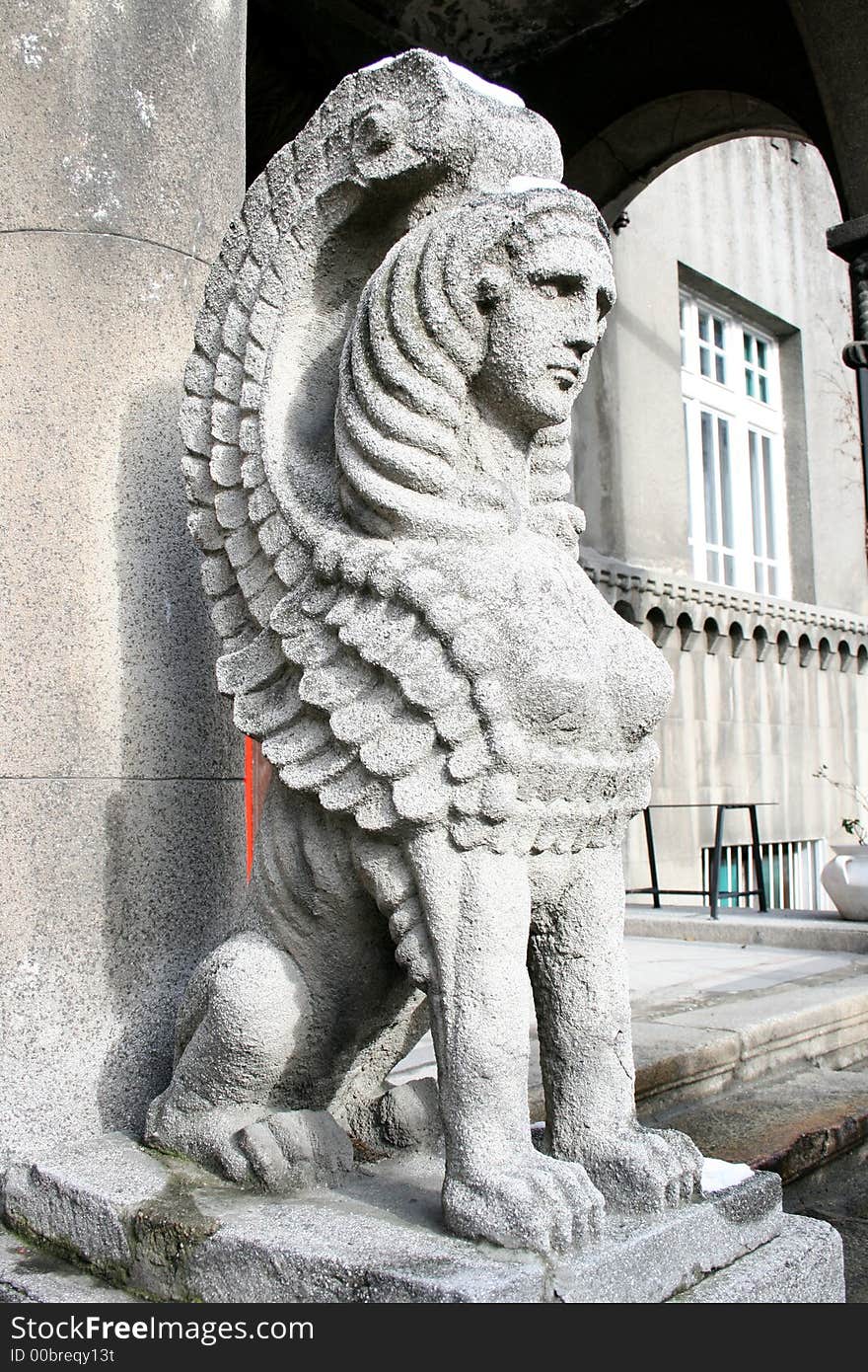 A sphinx as a decoration at the gate of a house. A sphinx as a decoration at the gate of a house