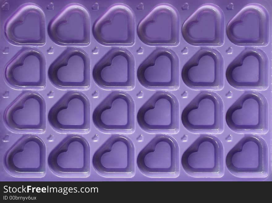 Violet hearts background - the symbol of love. Violet hearts background - the symbol of love