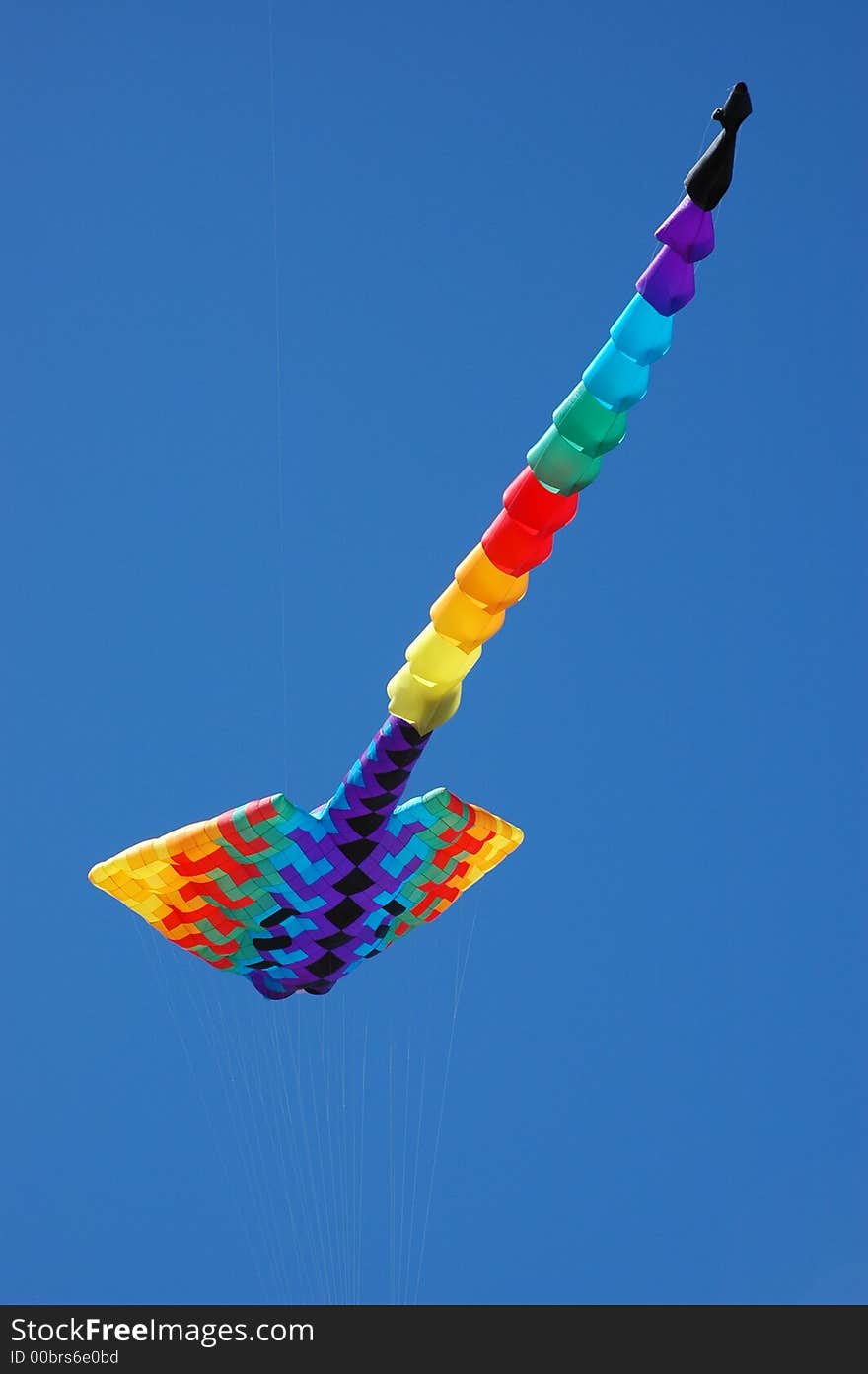 Colourful kite in the blue sky. Colourful kite in the blue sky