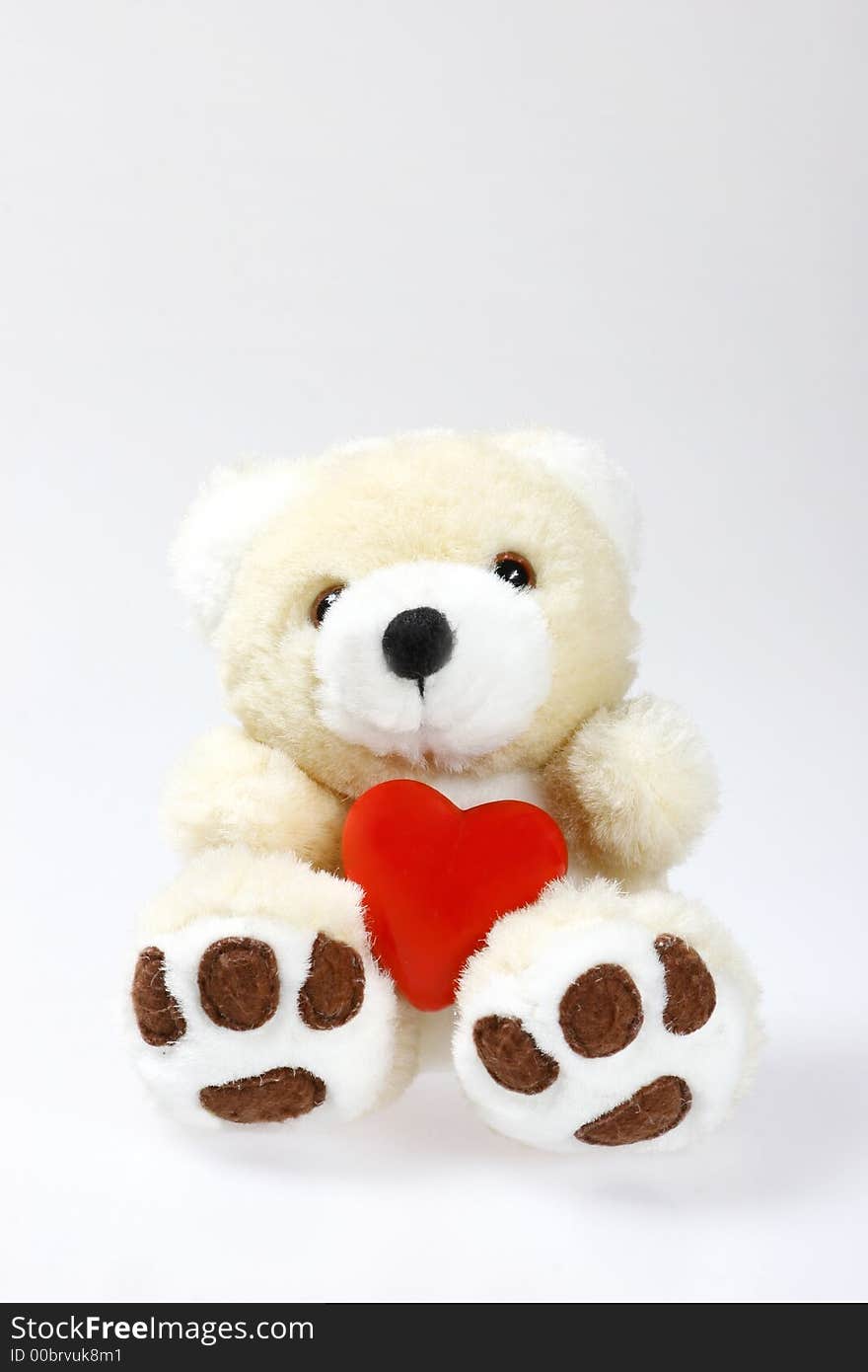 Teddy bear with heart and space