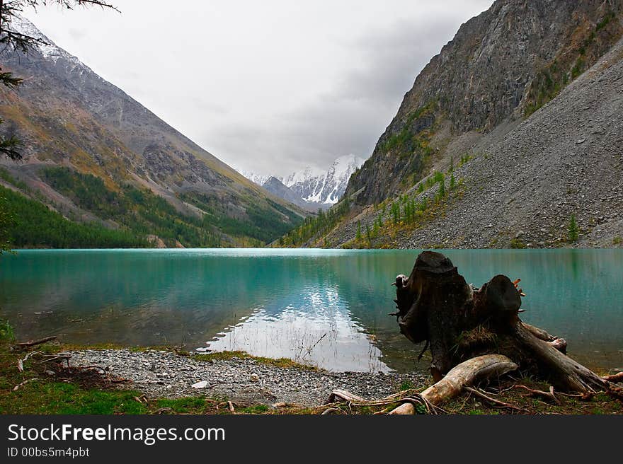 Turquoise lake and mountains.