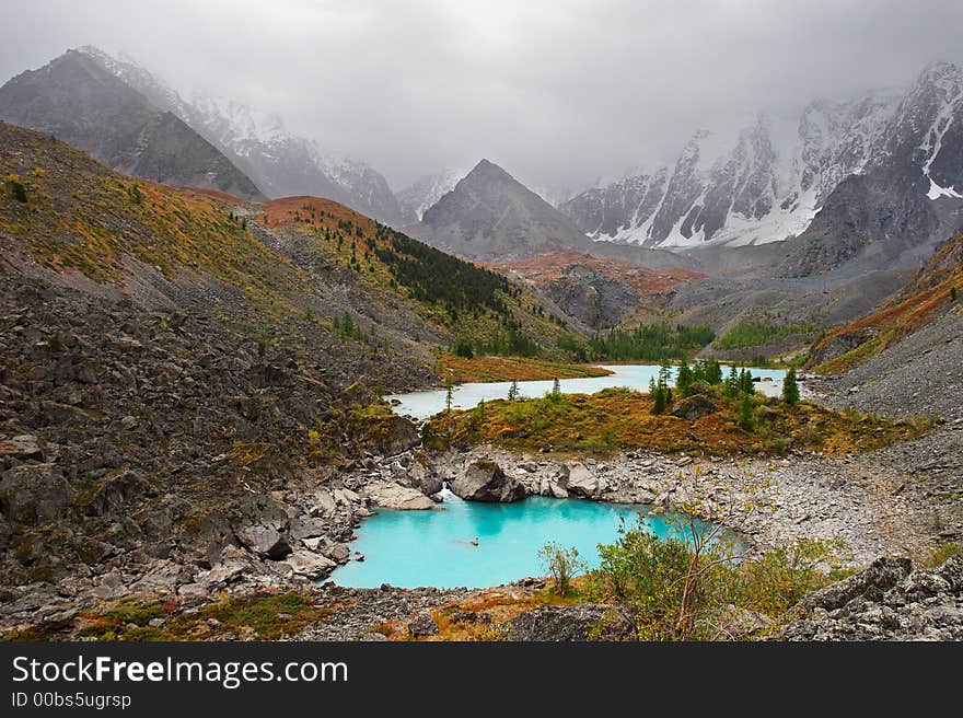 Turquoise lake and mountains.