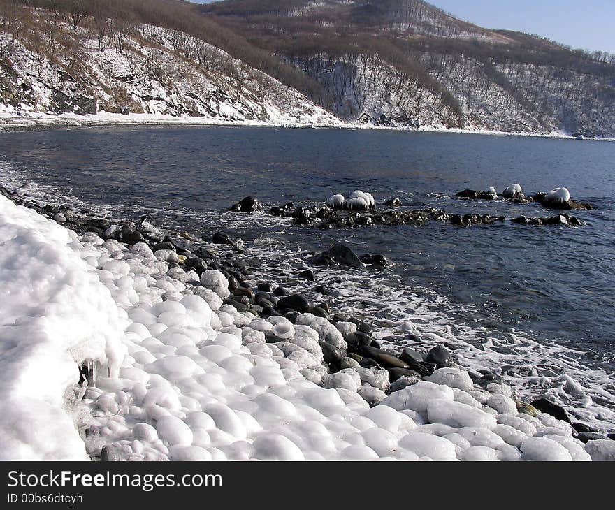 Stones an ice ocean a frost the nature winter the sea. Stones an ice ocean a frost the nature winter the sea