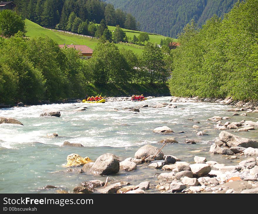 Whitewater rafting in a little yellow boat