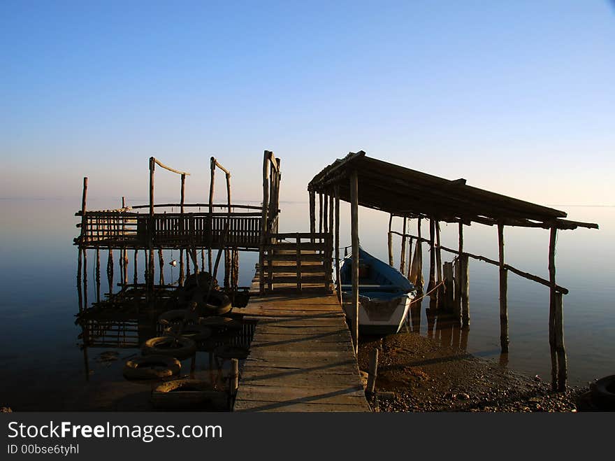 Tranquil scene with custom fishing boat anchorage