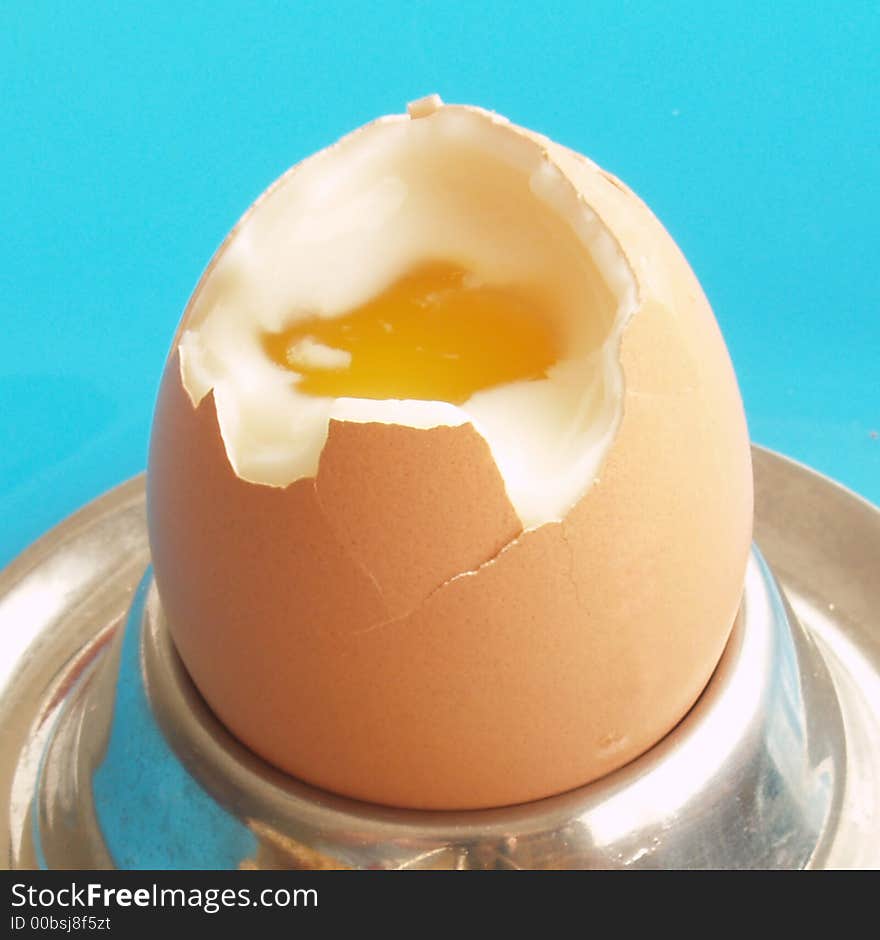 Close up of egg with blue background. Close up of egg with blue background