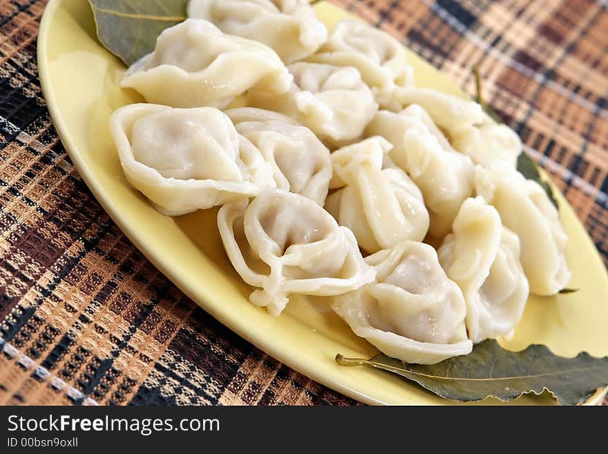 Ravioli with meat and bay leaf