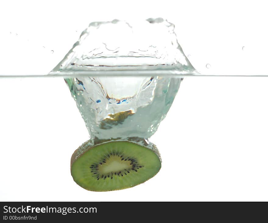 Fresh slice of kiwi in water on white background. Fresh slice of kiwi in water on white background