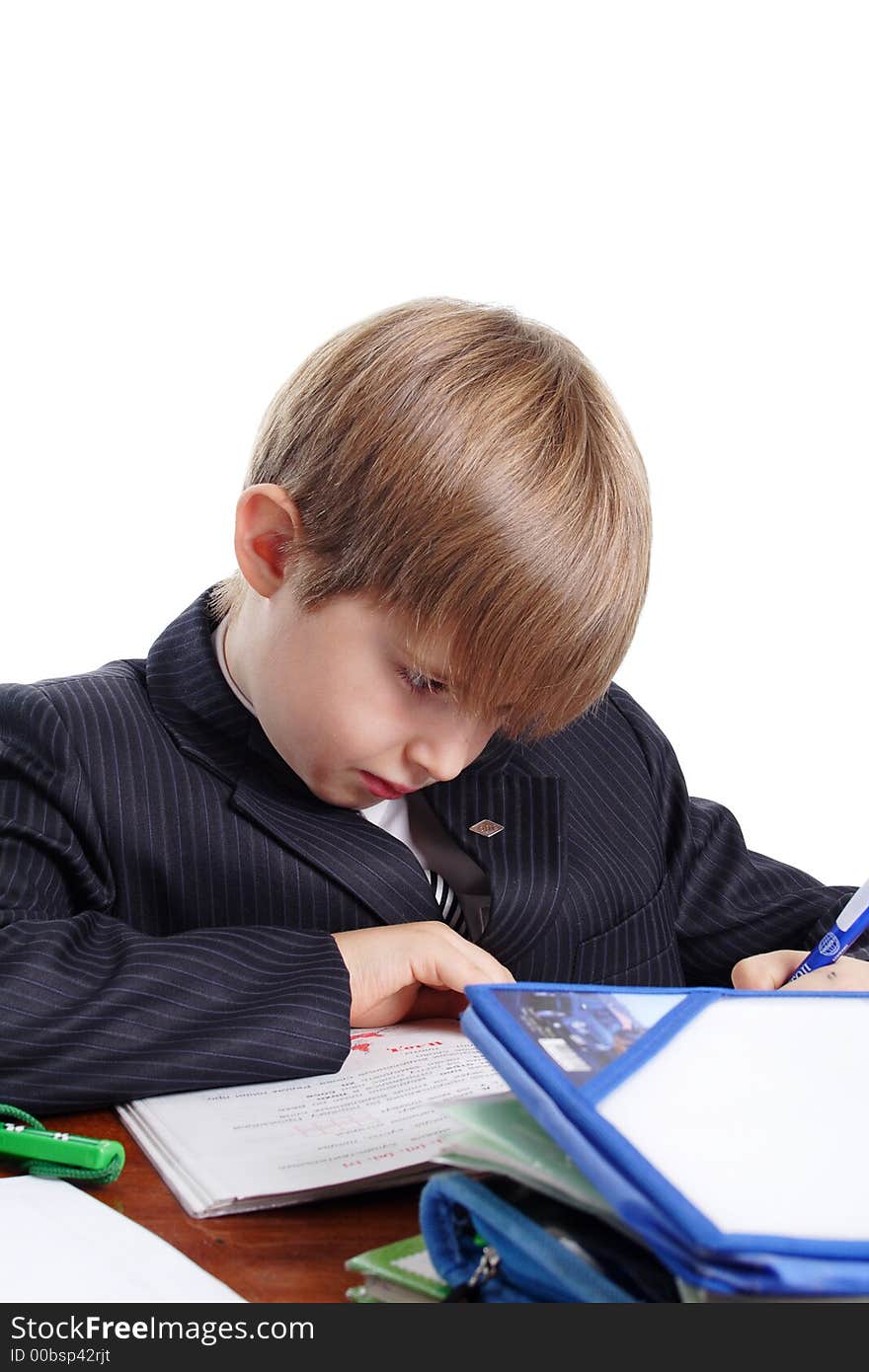 Close-up of boy in business suit. Shot in studio. Isolated with clipping path. Close-up of boy in business suit. Shot in studio. Isolated with clipping path.