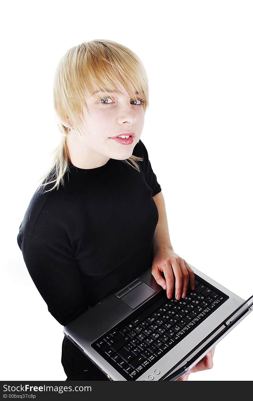 Girl with her computer. Shot in studio. Girl with her computer. Shot in studio.