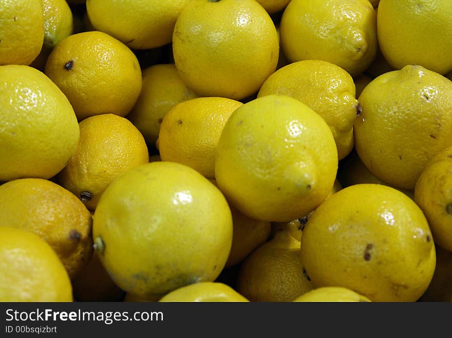 Lemons for sale at a local fruit and vegetable market. Lemons for sale at a local fruit and vegetable market