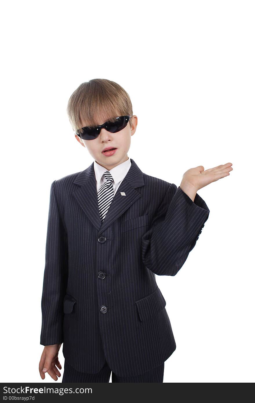 Close-up of boy in business suit. Shot in studio. Isolated with clipping path. Close-up of boy in business suit. Shot in studio. Isolated with clipping path.