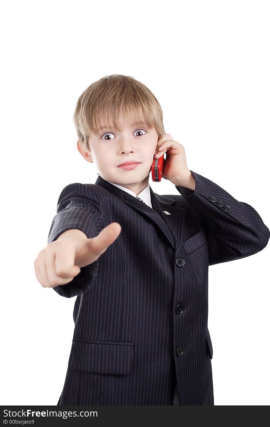 Close-up of boy in business suit. Shot in studio. Isolated with clipping path. Close-up of boy in business suit. Shot in studio. Isolated with clipping path.