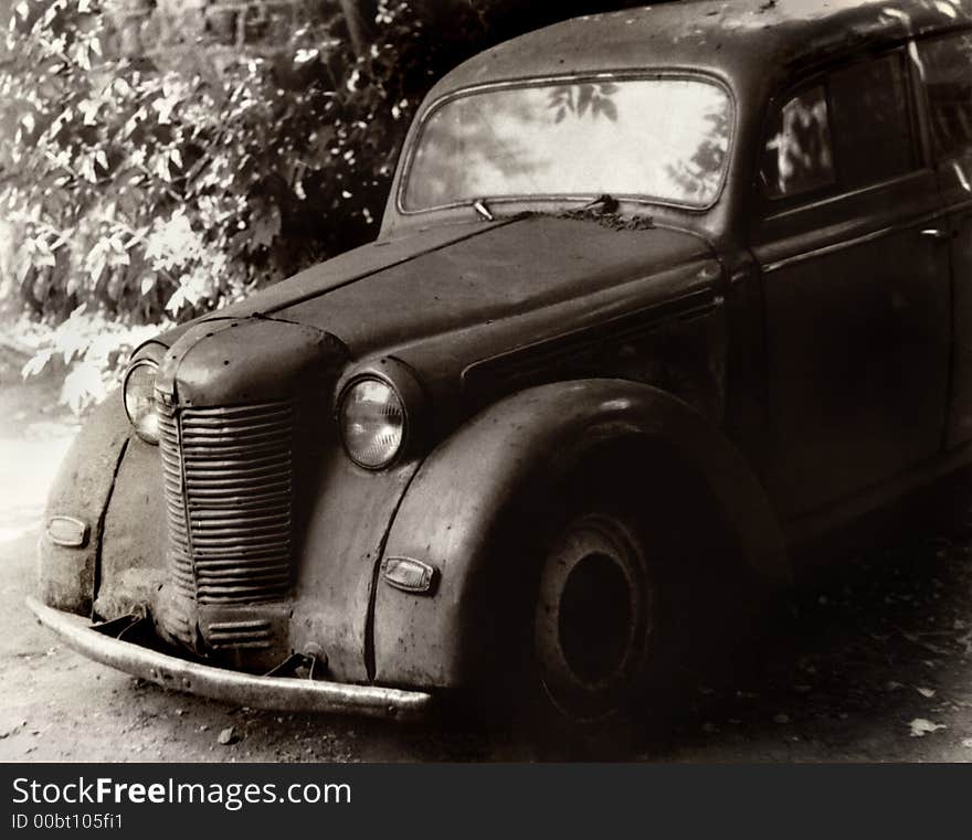 Old small car with the very sorrowful eyes. Old small car with the very sorrowful eyes