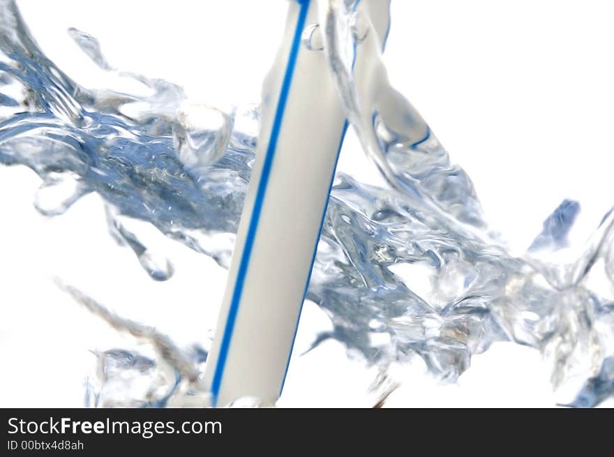 Straw and water bubbles isolated on white background