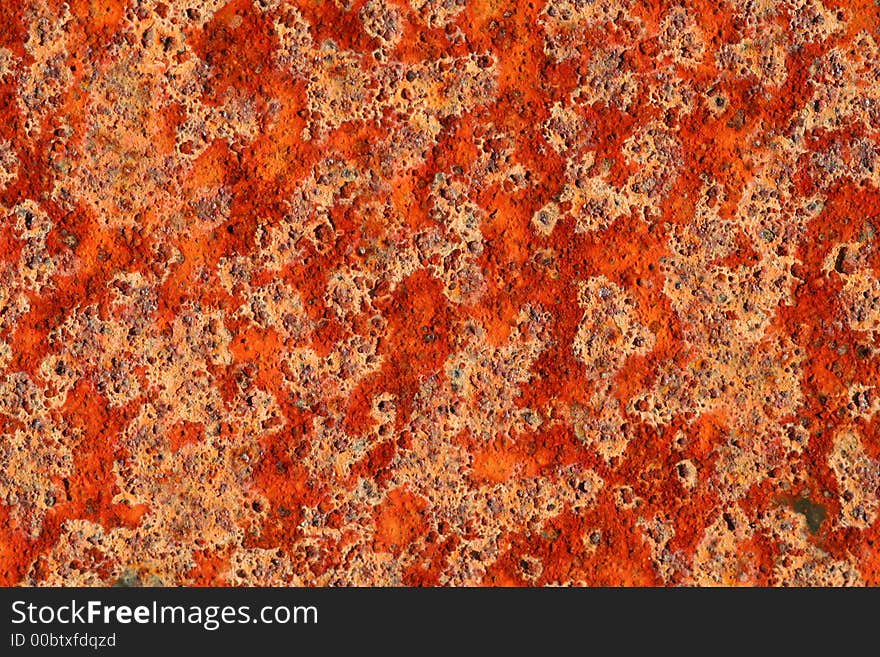 Detailed macro shot of a patch of rust, strong colours and interesting textures. Detailed macro shot of a patch of rust, strong colours and interesting textures.