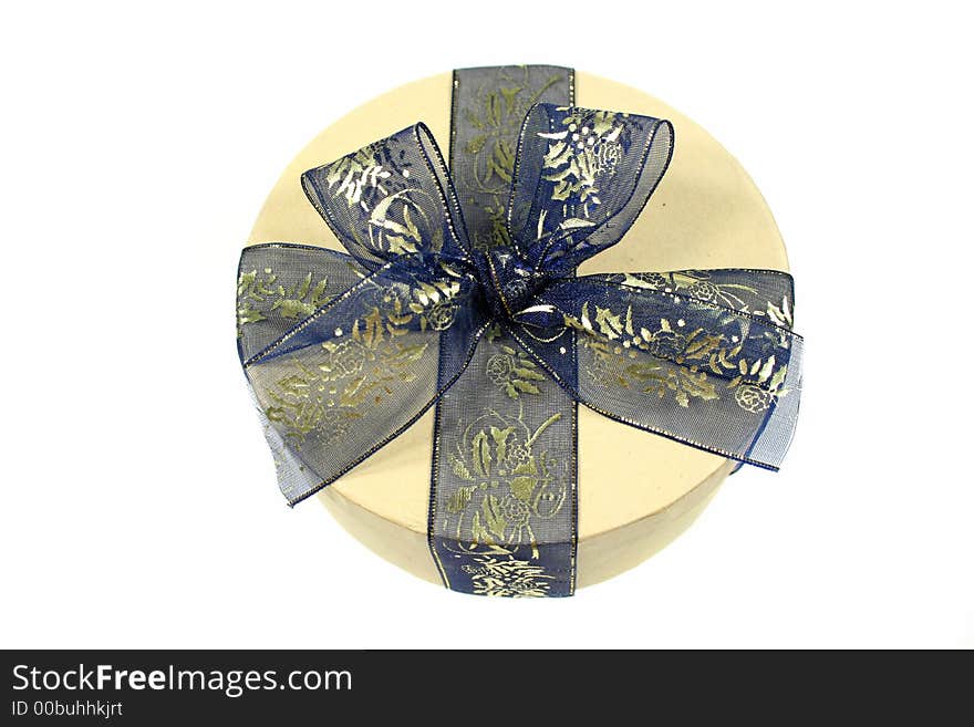 Blue and gold gift wrapped present. Blue and gold gift wrapped present.