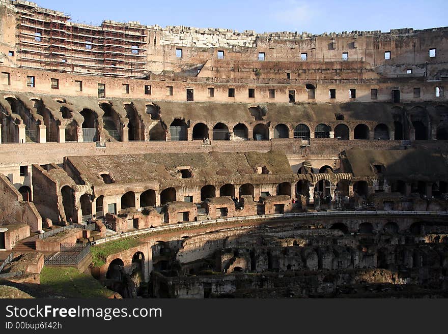 The interior of Flavian Amphitheatre aka The Colosseum in Rome. Visible is the archeological dig underneath the arena. The interior of Flavian Amphitheatre aka The Colosseum in Rome. Visible is the archeological dig underneath the arena