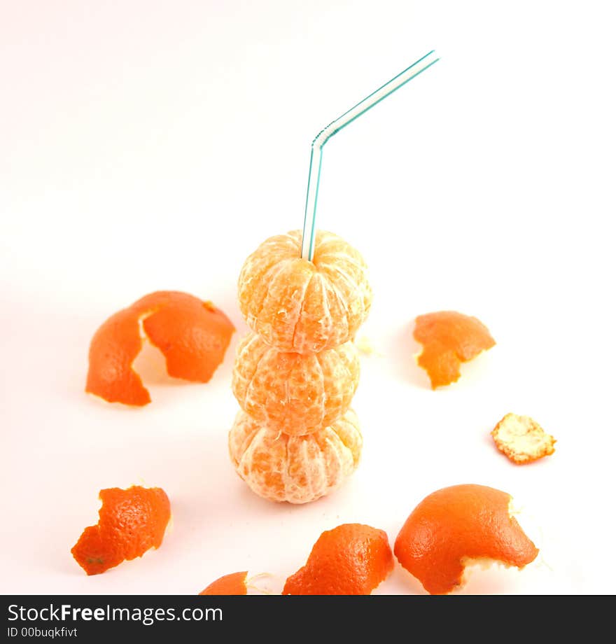 Peeled Mandarins With A Straw