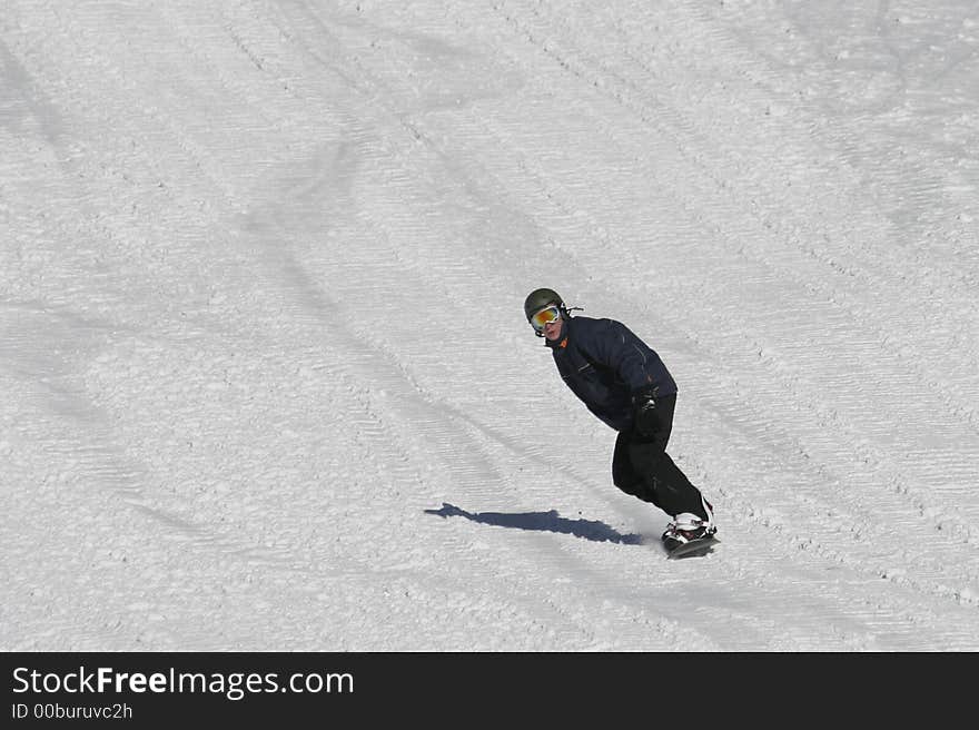 Photo of riding snowboarder on 200mm zoom