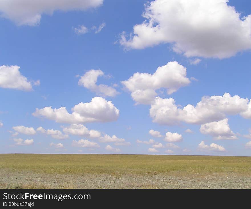 Cloudy landscape in sunny day with blue sky