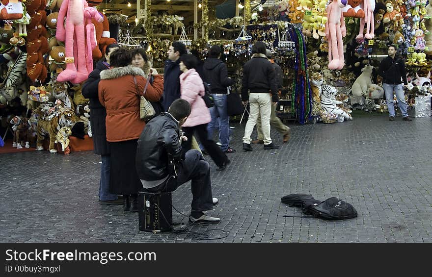 Street scene with musician in Piazza Navone in Rome city. Street scene with musician in Piazza Navone in Rome city