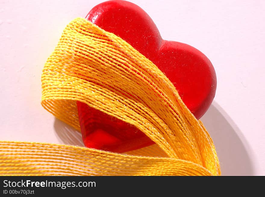 Red heart with yellow ribbon. Red heart with yellow ribbon