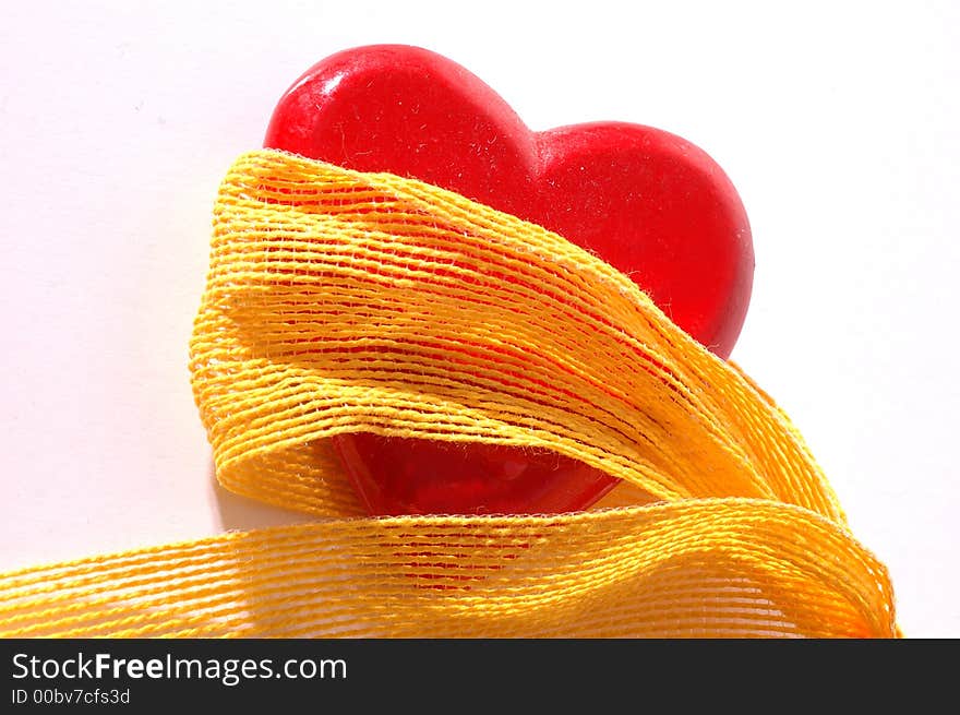 Red heart with yellow ribbon. Red heart with yellow ribbon