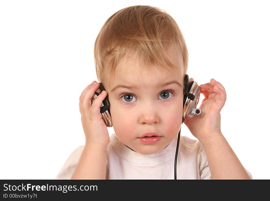 Baby with headphones isolated on white