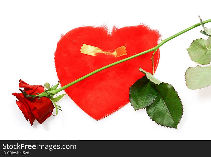 Close up for red rose and heart shape letter isolated on white background