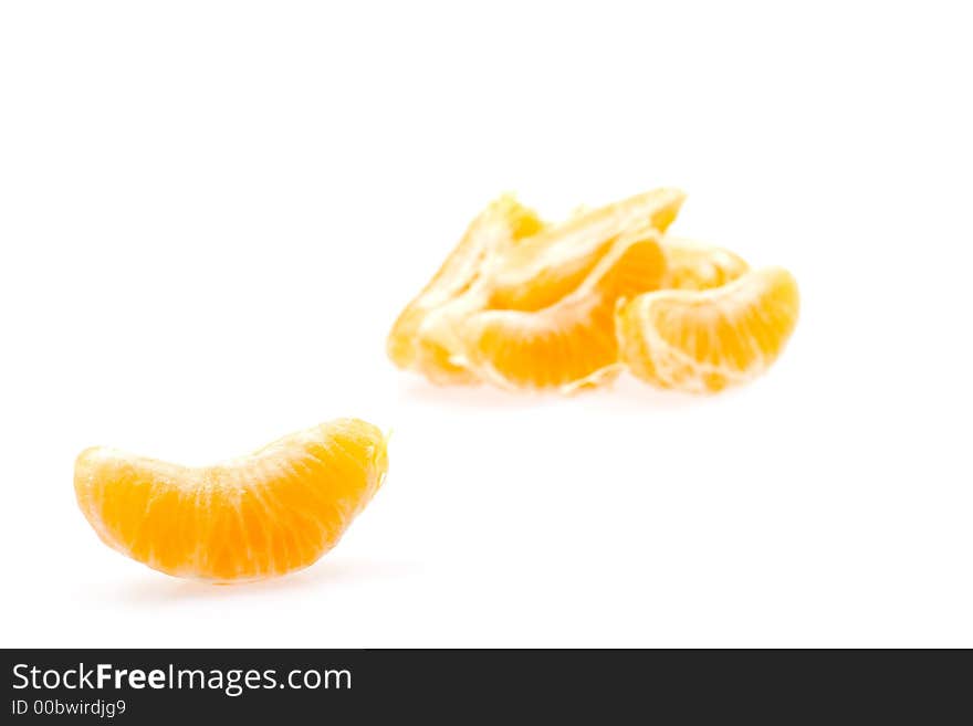 Piece of mandarines isolated on white background