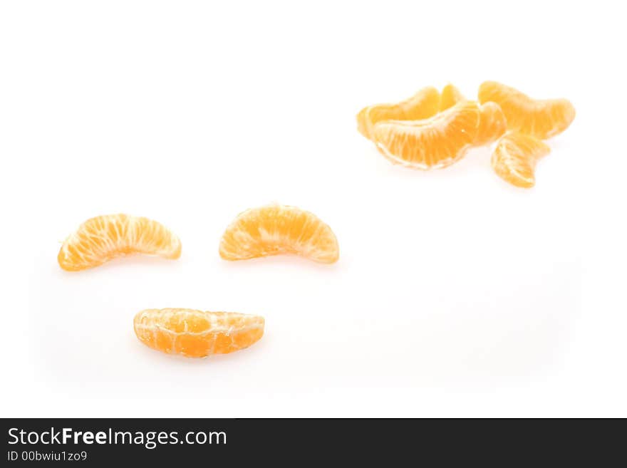 Piece of mandarines isolated on white background