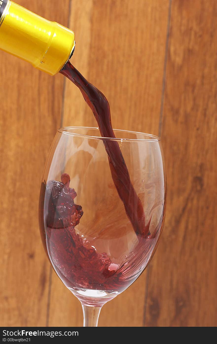 Macro of wine pouring in glass